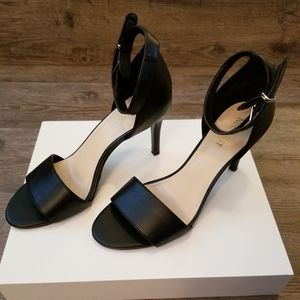 Nine West all black slingback heels.